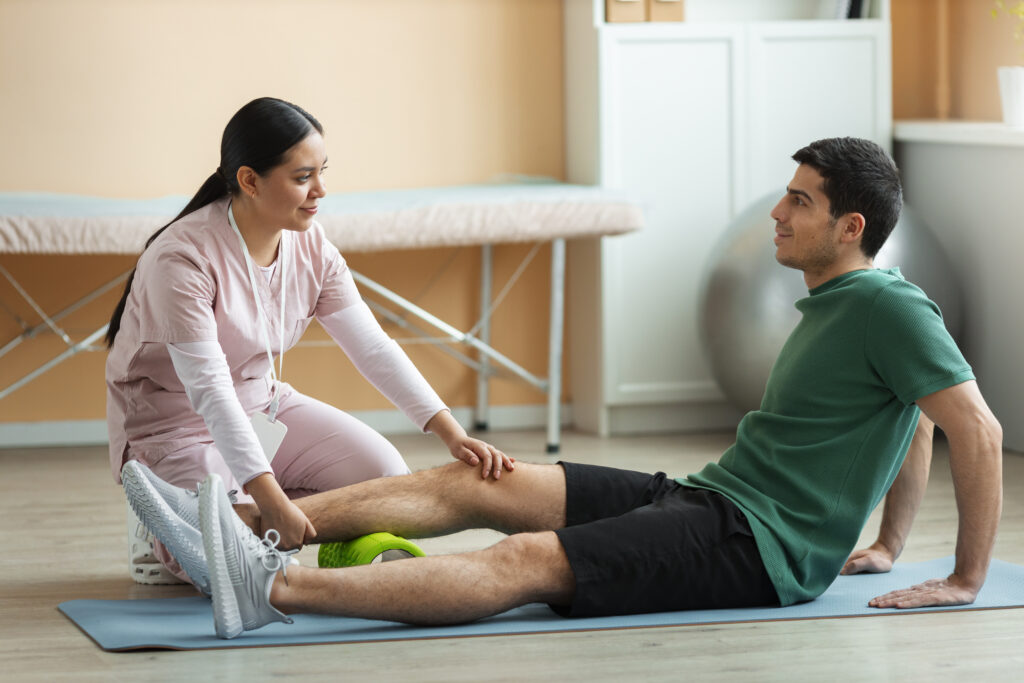 doctor helping patient rehabilitation
